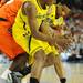 Michigan freshman Glenn Robinson III and sophomore Trey Burke fight to control the ball against Syracuse in the first half in the Final Four in Atlanta on Saturday, April 6, 2013. Melanie Maxwell I AnnArbor.com